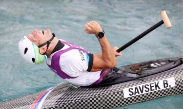 Slovenian Savsek smoothly slices stream securing slalom gold