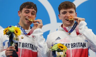 Tom Daley accepts first Olympic gold with partner Matty Lee