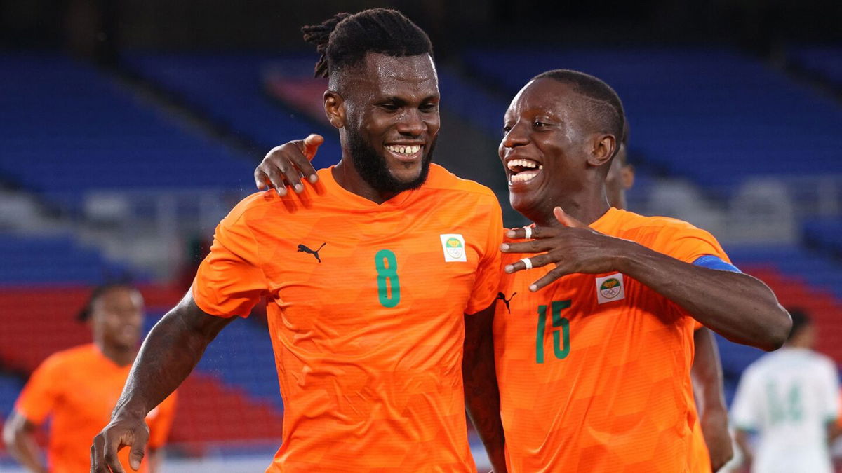 Two players from Cote d'Ivoire celebrate