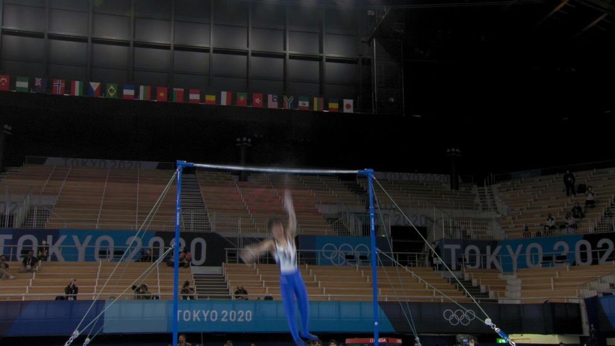 Japan's Uchimura falls off high bar in men's gymnastics