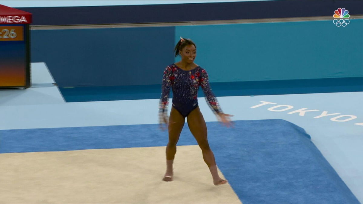 Simone Biles flies off floor surface in qualification