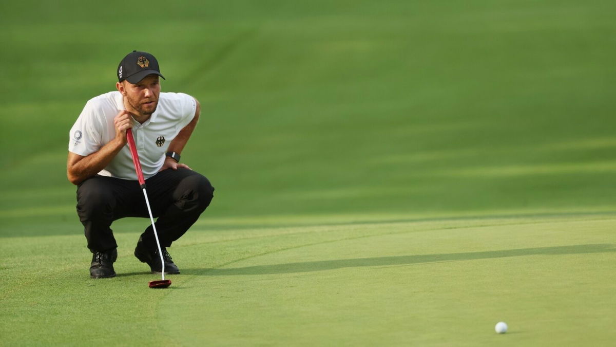 German golfer Kieffer putts in a long-distance eagle