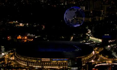 The Olympic Stadium lit up at night