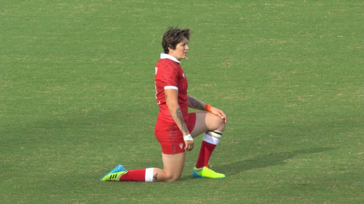 Canada and Brazil rugby players kneel in demonstration