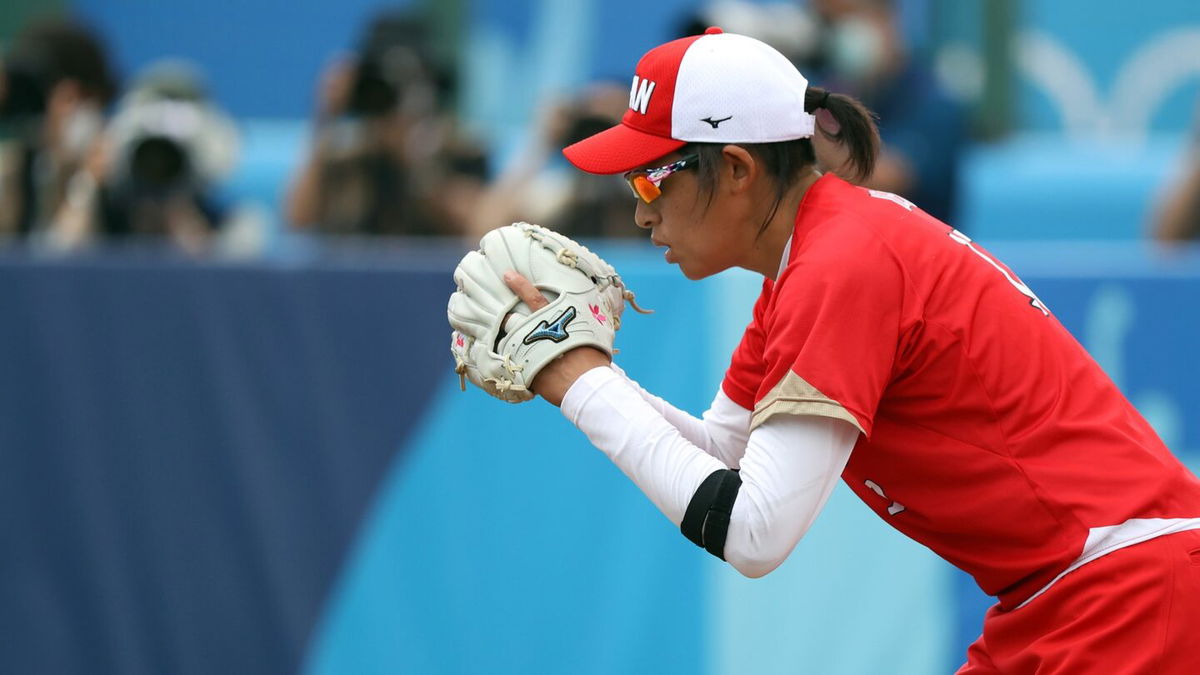 Japan narrowly avoids Mexico upset in extra innings