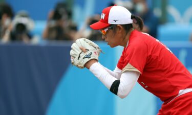 Japan narrowly avoids Mexico upset in extra innings