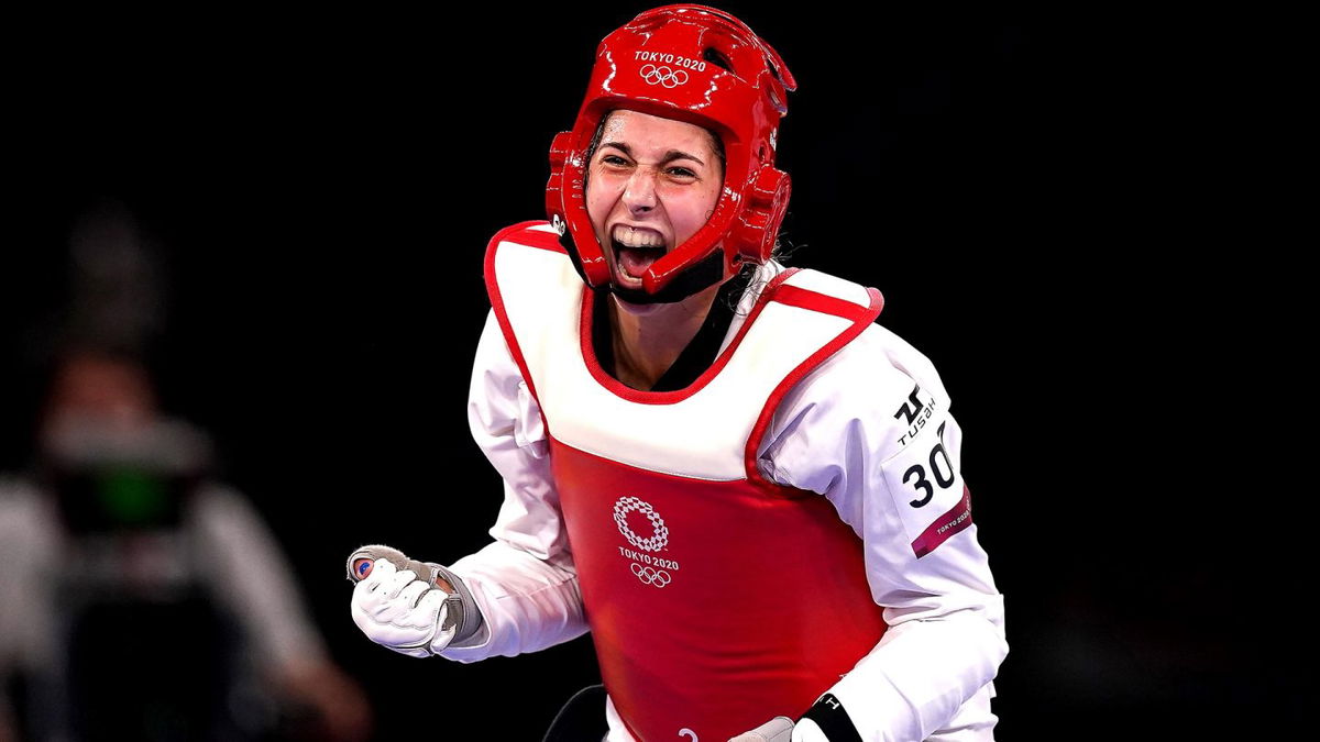 USA's Anastasija Zolotic celebrates victory against Turkey's Hatice Kubra Ilgun during the Women's 57kg Quarterfinal match at Makuharu Messe Hall A on the second day of the Tokyo 2020 Olympic Games in Japan.