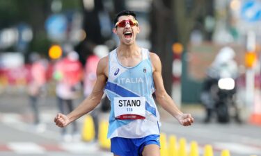 Massimo Stano celebrates his gold medal win in the men's 20km walk