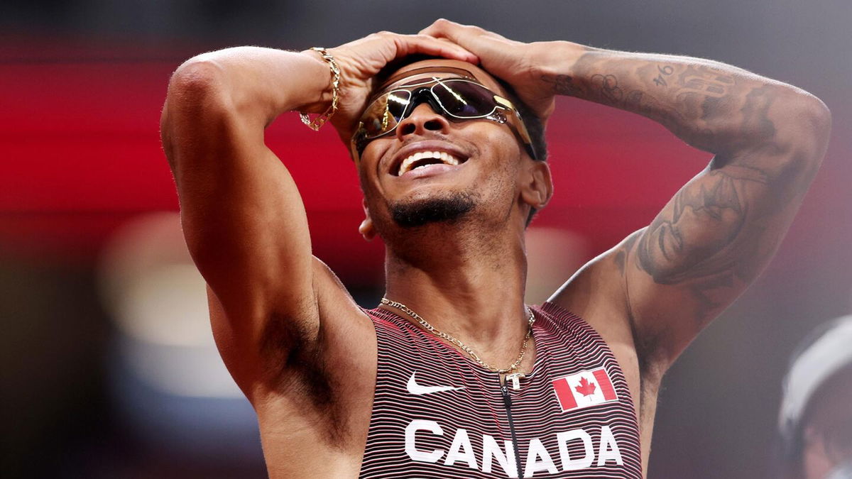 Andre De Grasse of Team Canada celebrates after winning the gold medal in the Men's 200m Final on day twelve of the Tokyo 2020 Olympic Games