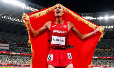 Soufiane Elbakkali of Morocco celebrates winning the gold medal after the Men's 3000m Steeplechase - Final on day ten of the Tokyo 2020 Olympic Games