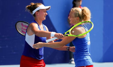 Barbora Krejcikova and Katerina Siniakova hug