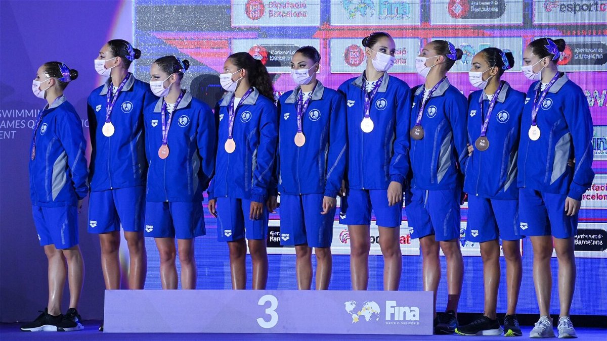 The Greece team pose with the bronze medal during the Team Free Routine medal ceremony as part of the FINA Artistic Swimming Olympic Games Qualifying Tournament 2021at Piscina Sant Jordi on June 11
