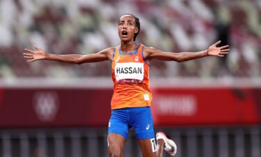 Sifan Hassan of Team Netherlands celebrates as she wins the gold medal in the Women's 10