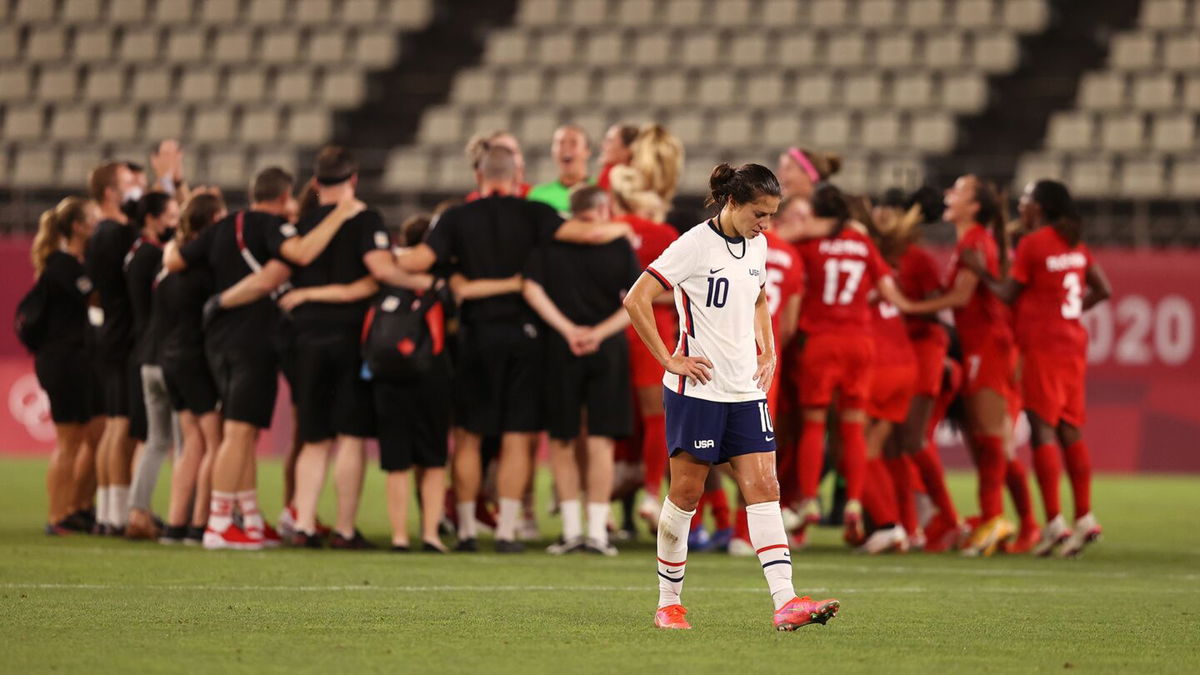 Carli Lloyd of the United States walks off the field following defeat in the women's semifinal match between USA and Canada on day ten of the Tokyo Olympic Games at Kashima Stadium.