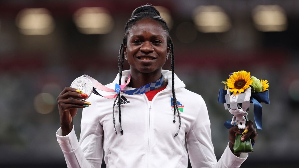 Christine Mboma of Namibia holds her silver medal for the Women's 200m at the 2020 Olympic Games