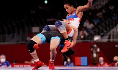 Belly to back suplex in Olympic wrestling ring