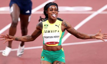 Elaine Thompson-Herah of Team Jamaica celebrates after winning the gold medal in the Women's 200m Final on day eleven of the Tokyo 2020 Olympic Games