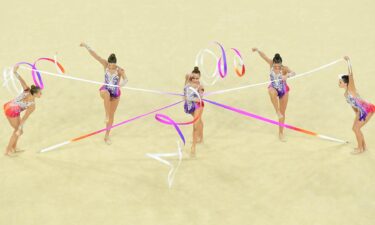 Rhythmic gymnasts group competes