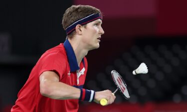 Viktor Axelsen of Team Denmark competes against Chen Long of Team China during the Men’s Singles Gold Medal match on day ten of the Tokyo 2020 Olympics