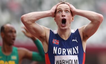 Karsten Warholm of Team Norway reacts after winning the gold medal in the Men's 400m Hurdles Final on day eleven of the Tokyo 2020 Olympic Games