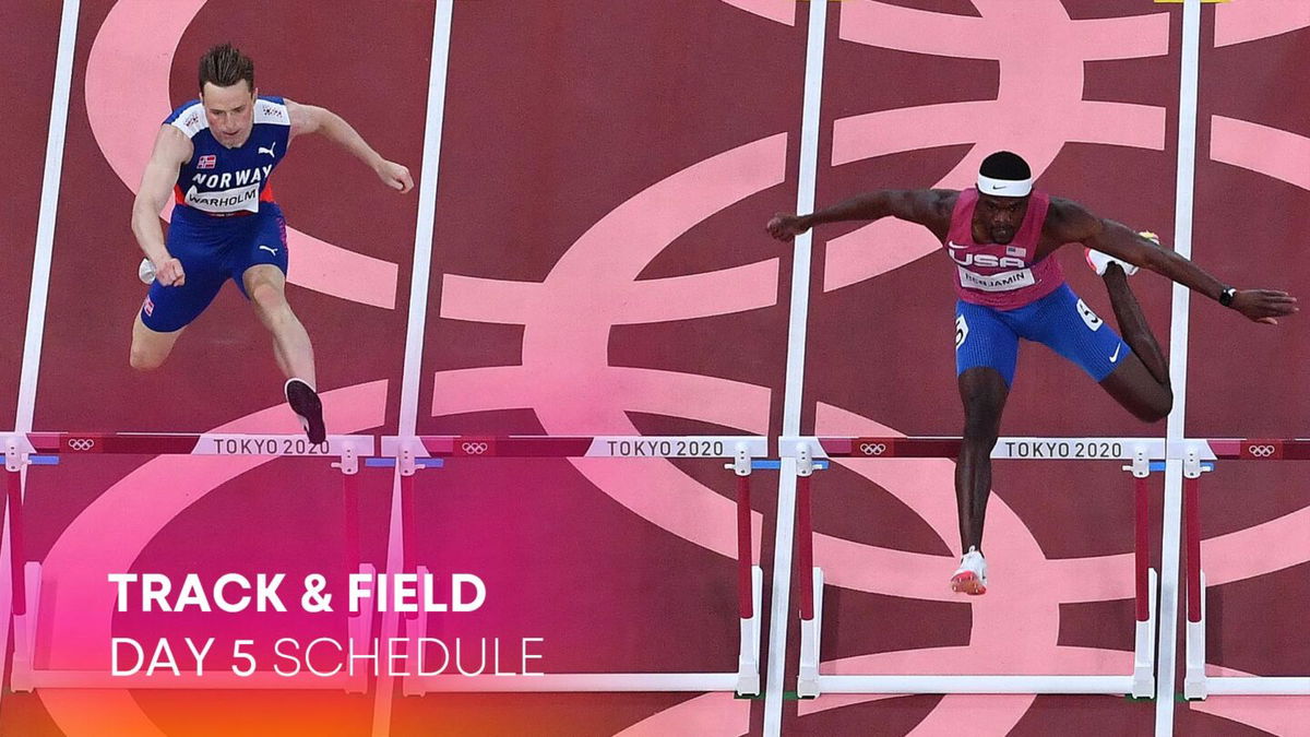 Norway's Karsten Warholm (L) and USA's Rai Benjamin compete in the men's 400m hurdles semi-finals during the Tokyo 2020 Olympic Games