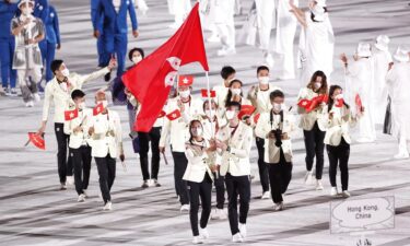 The Olympic delegation of Hong Kong parades into the Olympic Stadium