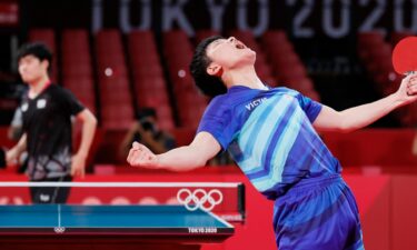 Harimoto Tomokazu of Japan screams to the heavens after winning a point