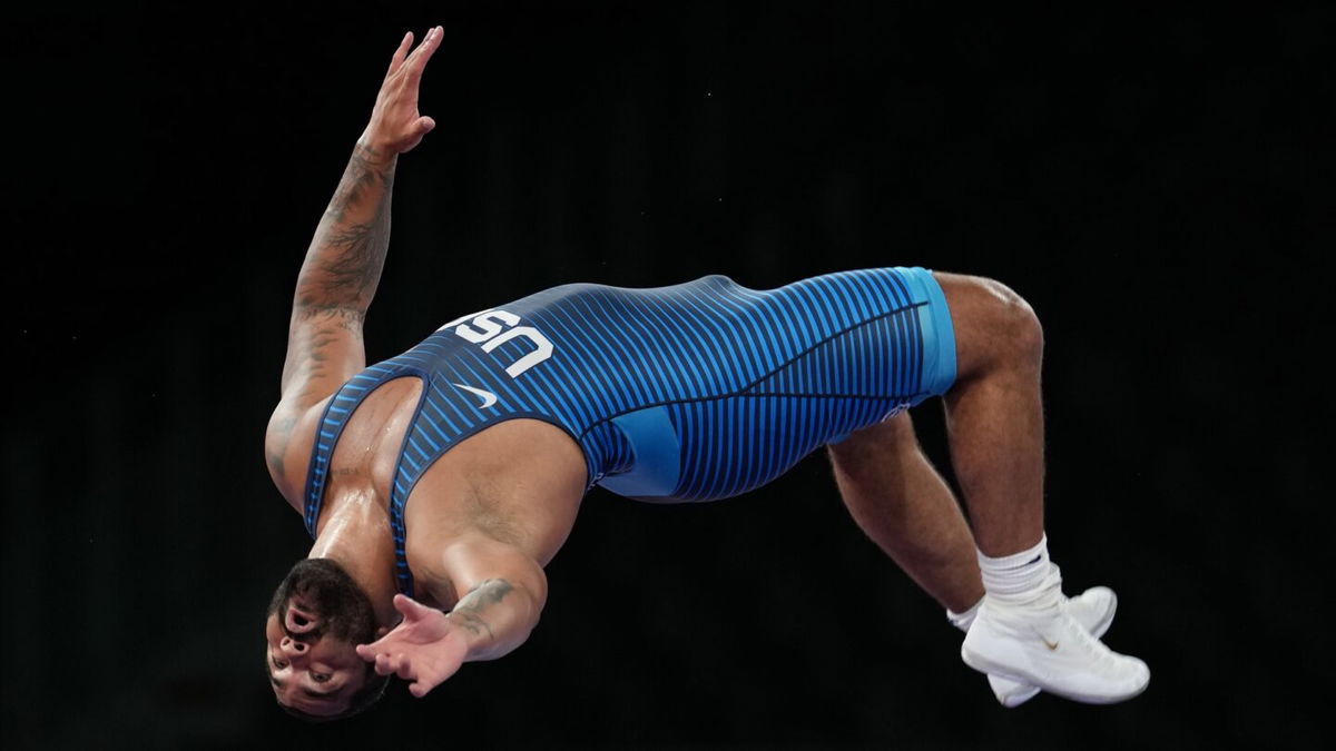 USA's Gable Steveson celebrates the gold medal after the men's freestyle 125kg wrestling competition