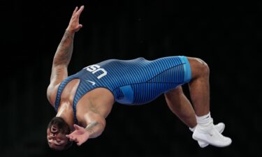 USA's Gable Steveson celebrates the gold medal after the men's freestyle 125kg wrestling competition