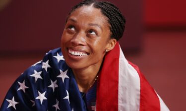 Allyson Felix celebrates after winning the bronze medal in the Women's 400m Final