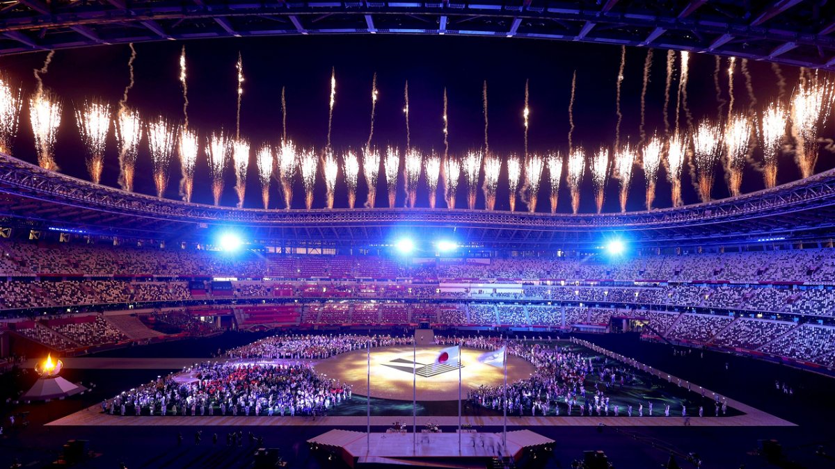 Fireworks erupt above the stadium during the Closing Ceremony of the Tokyo 2020 Olympic Games