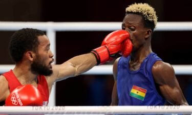 U.S. featherweight Duke Ragan (in red) beat Sam Takyi of Ghana to earn a spot in the finals at the Tokyo Olympics.