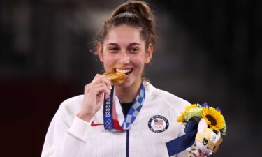 American taekwondo gold medallist Anastasija Zolotic enjoys a tasty treat.