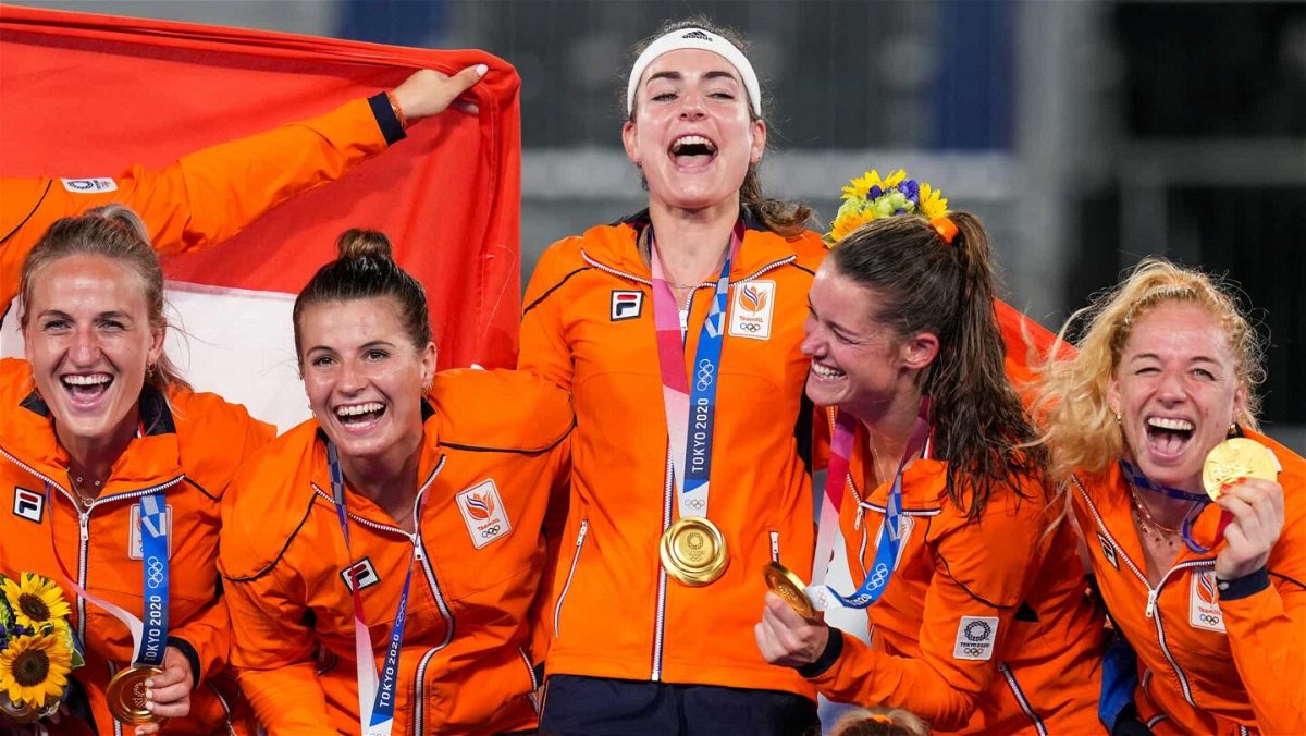 The Netherlands women's hockey team celebrate.