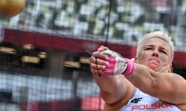 Poland's Anita Wlodarczyk competes in the women's hammer throw qualification during the Tokyo 2020 Olympic Games
