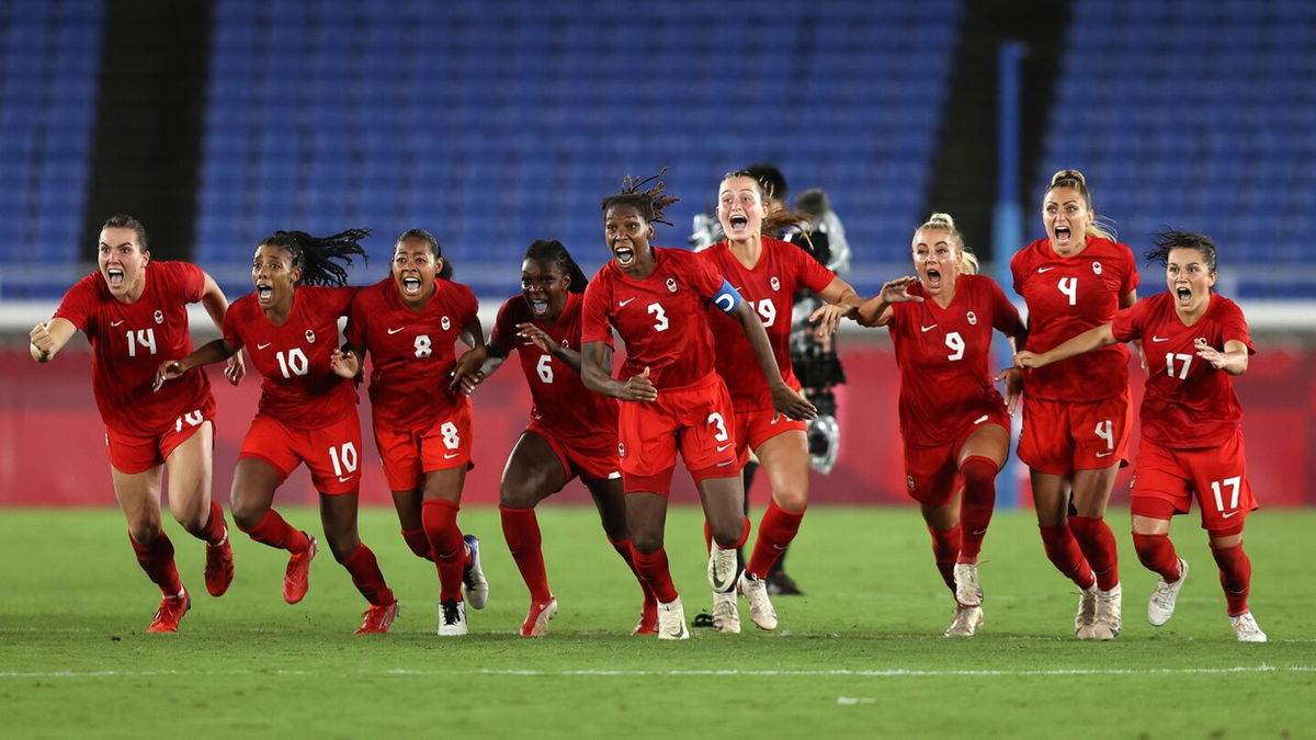 Canada celebrates its penalty shootout win over Sweden in the gold medal match.