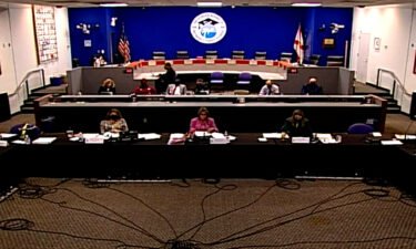 South Florida's Broward County Public Schools will withdraw its mask mandate after the governor threatened to withhold funding from districts that require face coverings. The Broward County school board had voted July 28 to mandate masks.