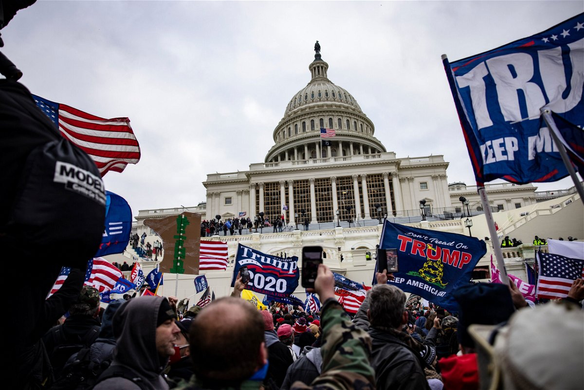 <i>Samuel Corum/Getty Images</i><br/>Pro-Trump supporters storm the U.S. Capitol following a rally with President Donald Trump on January 6 in Washington