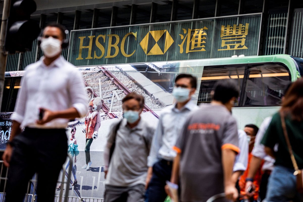 <i>Isaac Lawrence/AFP/Getty Images</i><br/>HSBC staged a strong recovery in the first half of the year. Pedestrians walk outside the HSBC Main Building in Hong Kong on August 2.
