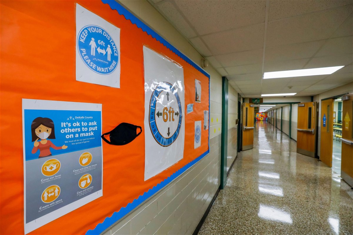 <i>Erik S. Lesser/EPA-EFE/Shutterstock</i><br/>Signs continue to encourage mask wearing and social distancing for the upcoming fall semester despite ventilation improvements at Kelley Lake Elementary School in Decatur