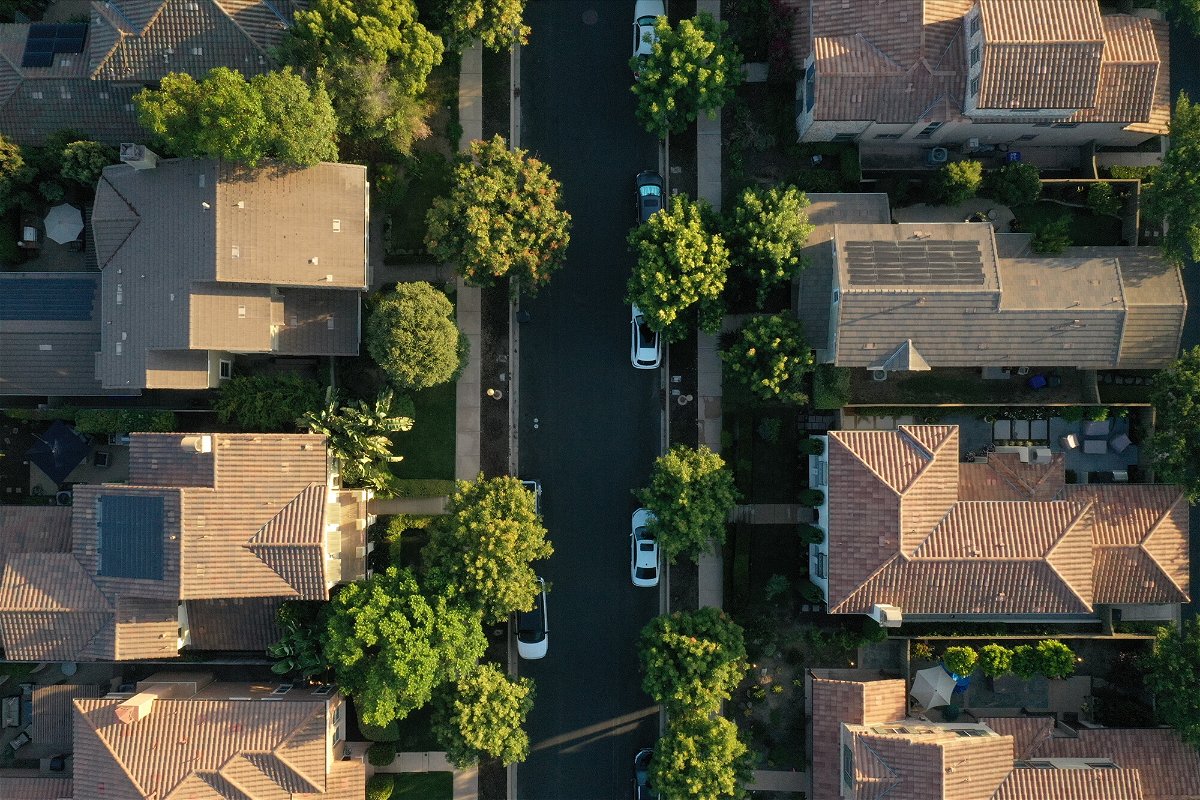 <i>Bing Guan/Bloomberg/Getty Images</i><br/>Wall Street is buying up family homes. This image shows an aerial photograph of single-family homes in San Diego