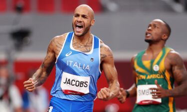 Lamont Marcell Jacobs of Team Italy celebrates after winning the Men's 100m Final