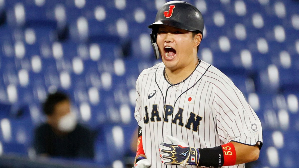 Infielder Munetaka Murakami of Japan celebrates hitting a solo home run in the third inning during the gold medal baseball game against United States.