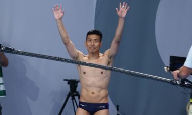 Ken Terauchi of Japan thanks the spectators after his final dive in the men's 3m springboard final on day eleven of the Tokyo 2020 Olympic Games at Tokyo Aquatics Centre on August 03