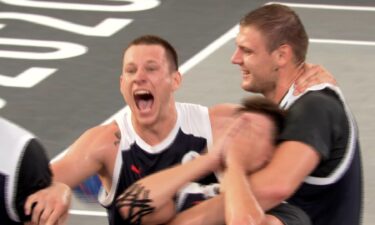 Latvian 3x3 basketball team celebrate after their win.