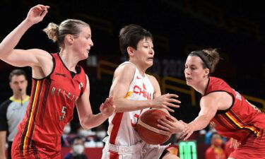 China takes down Belgium to finish group play unbeaten