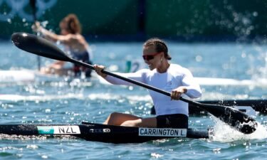 Lisa Carrington wins kayak gold at third straight Olympics