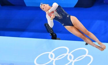 Jade Carey flips during her floor routine