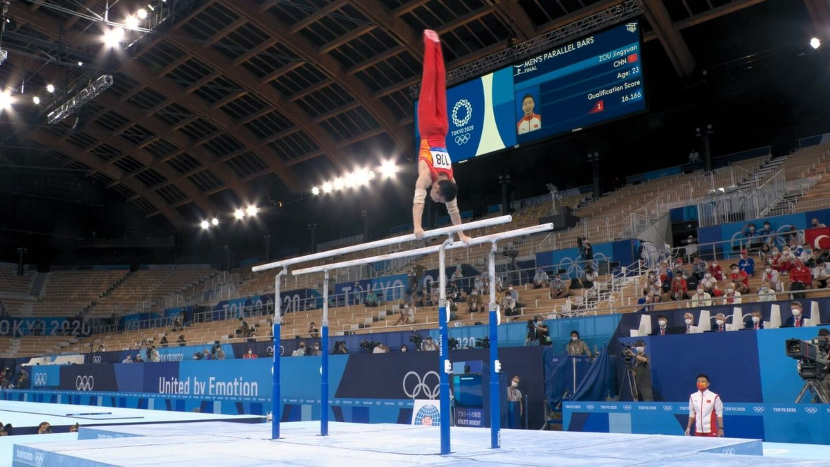 Zou Jingyuan wins parallel bars final with 16.233