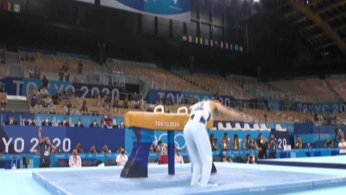 Whitlock defends pommel horse title